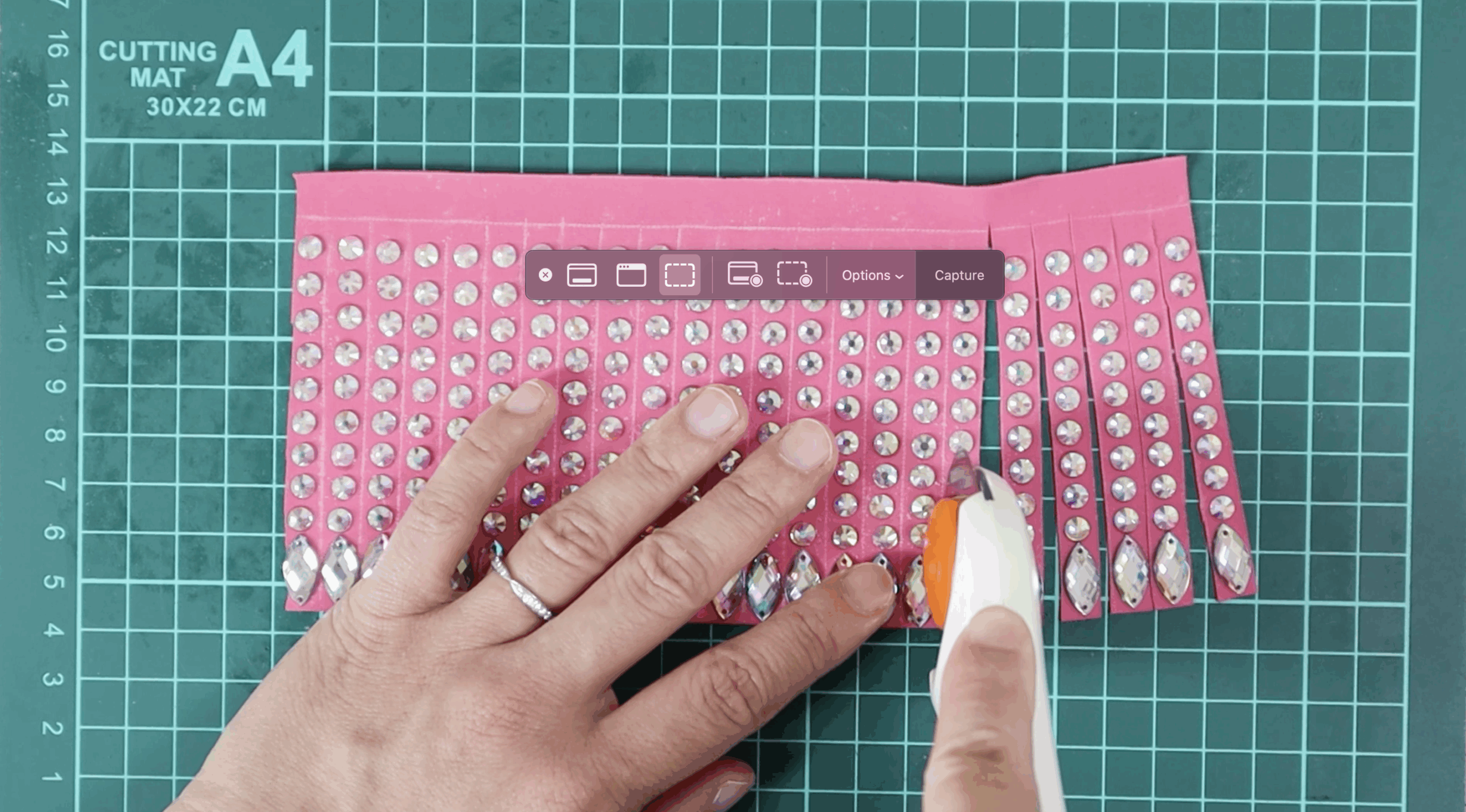 Cut-strands-of-rhinestone-fringe-on-rhinestone-dance-costumes - SPARKLY